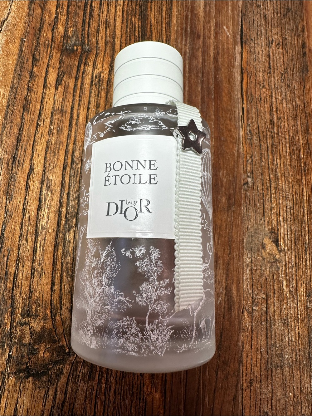 Dior Bonne Étoile Bath & Body Lotion — White with Silver Star Accente-empty bott